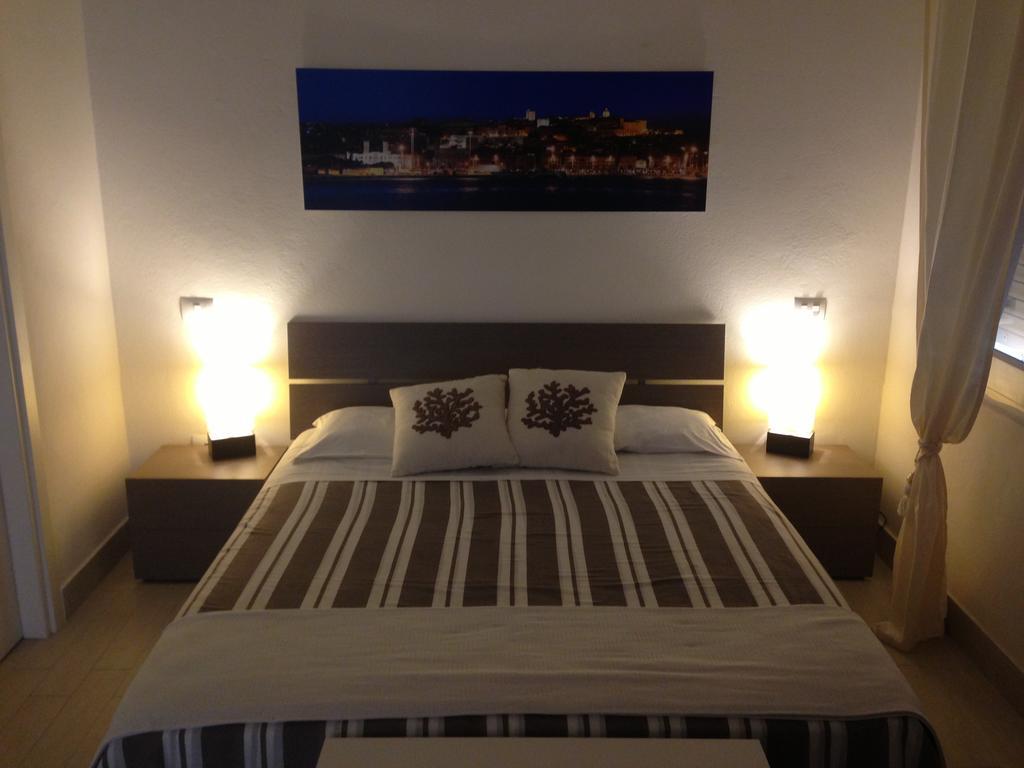 Apartamento Car'Loft Beachside Cagliari Habitación foto